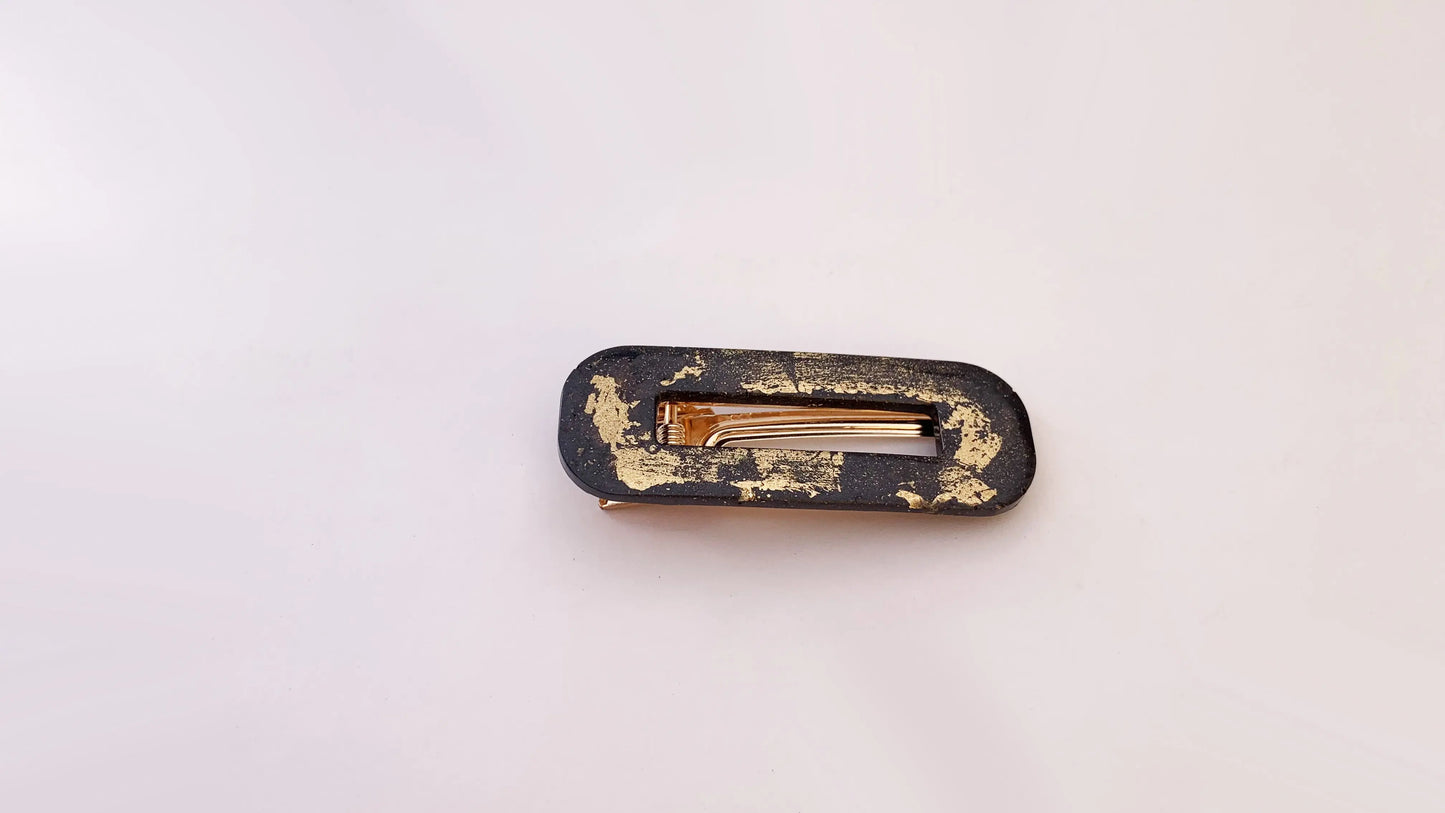 pasador cabello resina negro y oro